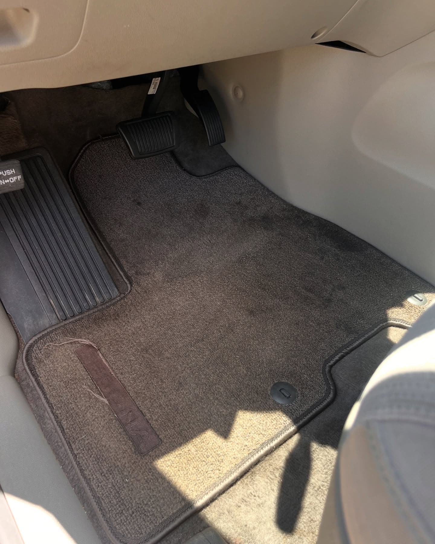 After interior detail — clean, vacuumed rear floor mat in the same vehicle, Cumming GA