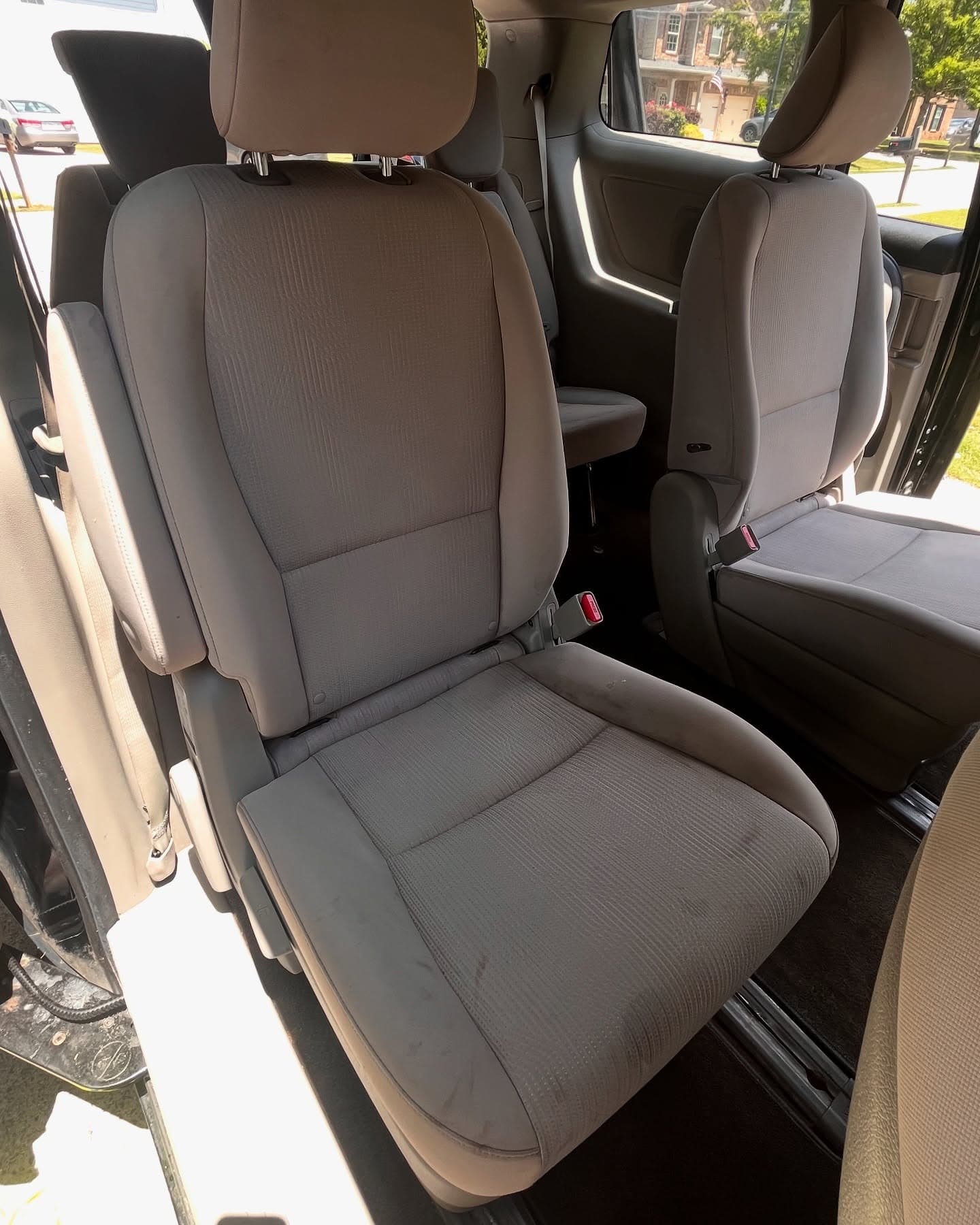 Clean, freshly detailed car interior with wiped-down seats and dash, Cumming GA